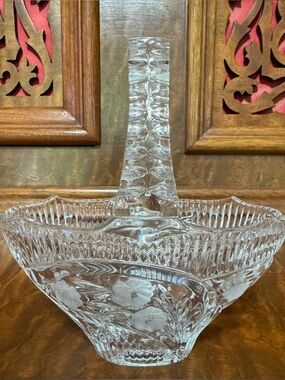 Vintage crystal glass basket with delicate floral design.